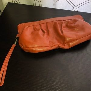 Orange clutch/ Wristlet